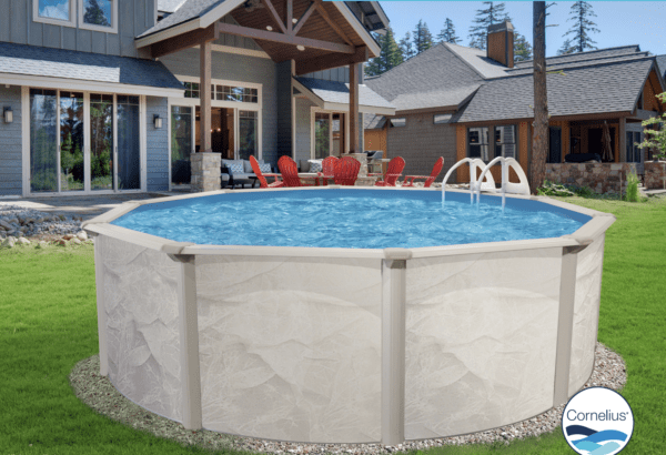 Above-ground swimming pool with clear blue water, surrounded by lounge chairs, in the backyard of an elegant house with lush greenery.